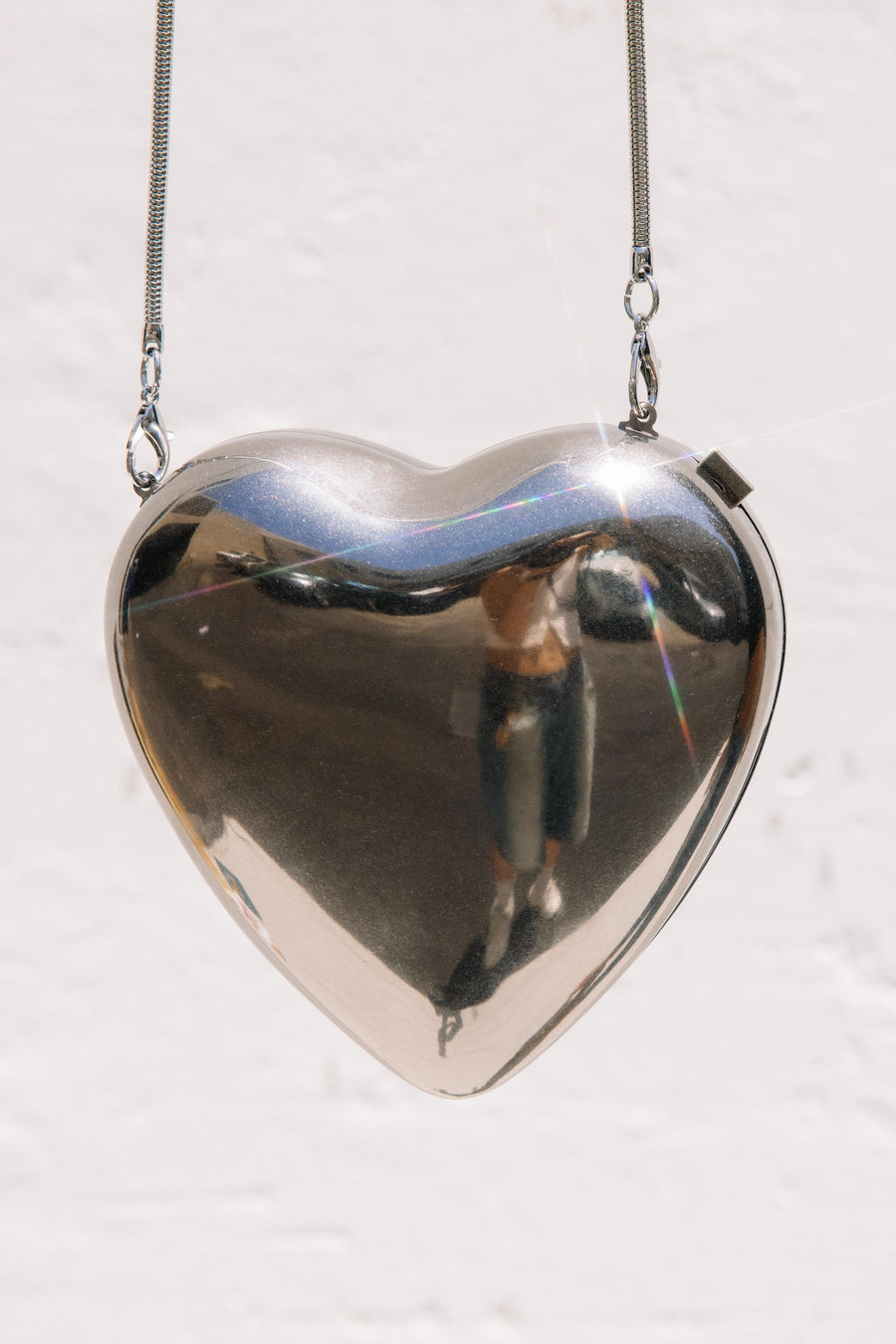 Metal Heart Clutch in Silver/Black