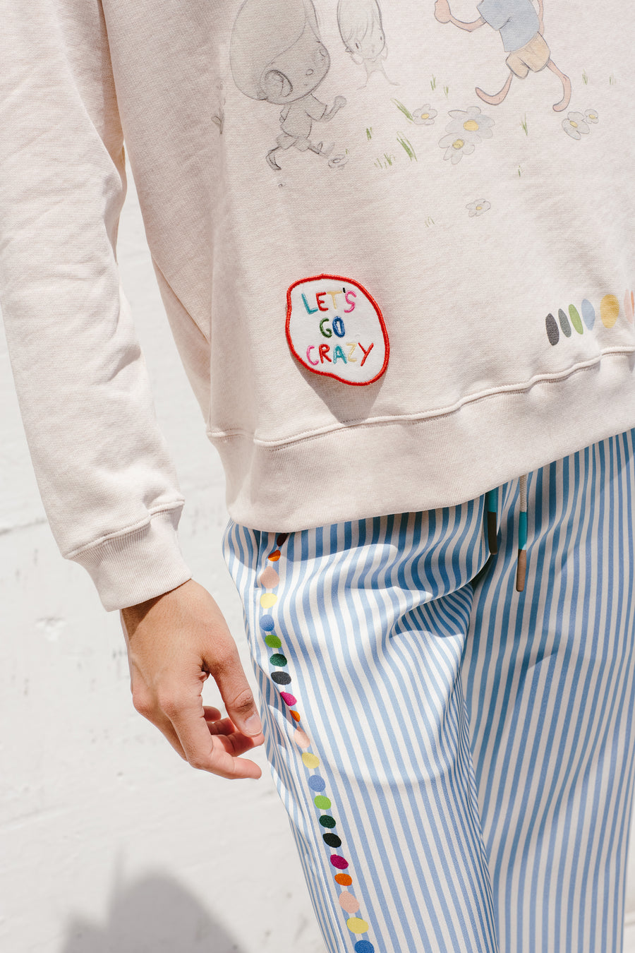 Mira Mikati x Javier Calleja Printed Sweater With Velcro Patches & Pouch In Light Beige
