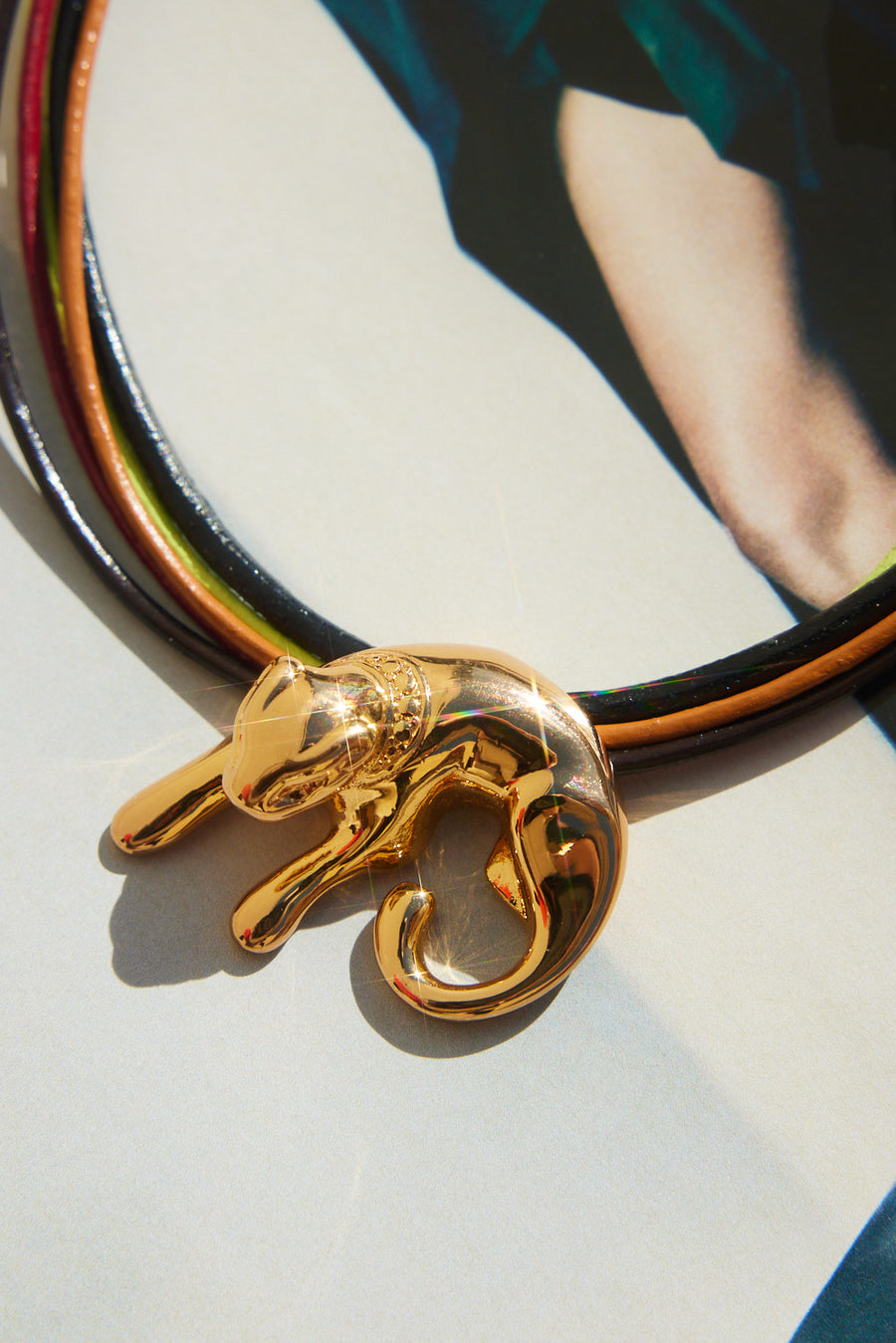 MULTICOLOR LEATHER ROPE NECKLACE WITH GOLD PLATED PUMA CHARM